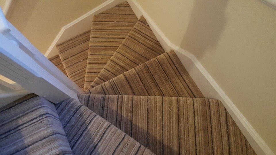 An elegant Short-Pile Jade Carpet on the stairs.